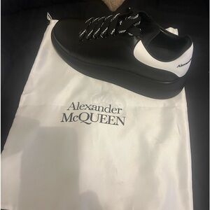 Black and white Alexander McQueen size 48, which is a men's  size 14